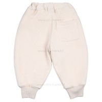 شلوار اسلش مخملی داخل کرک طرح ساده رنگ کرم