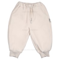 شلوار اسلش مخملی داخل کرک طرح ساده رنگ کرم